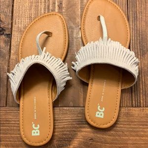 Blue suede fringe flats